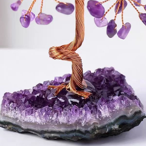 Amethyst crystal tree on a large amethyst crystal base