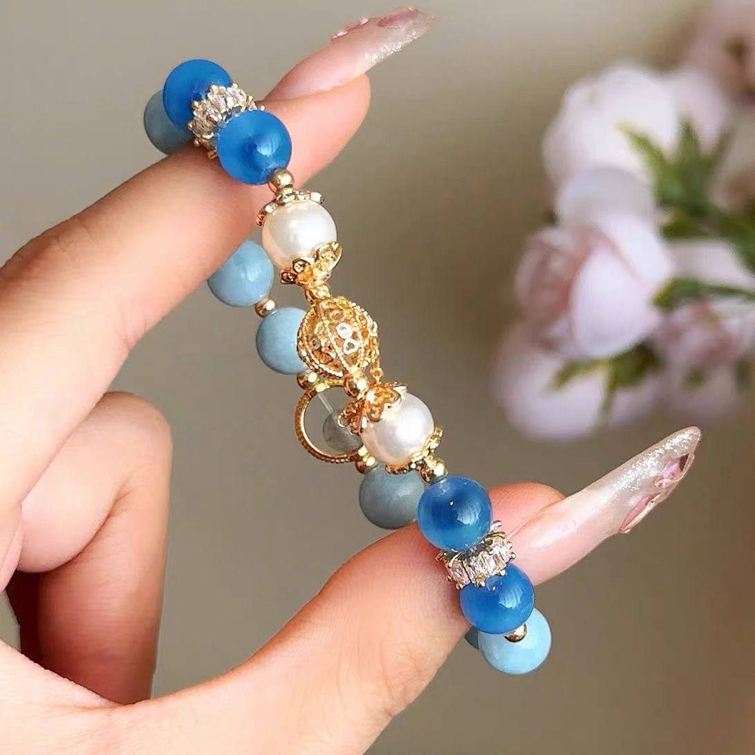 bue bracelet with gold accents