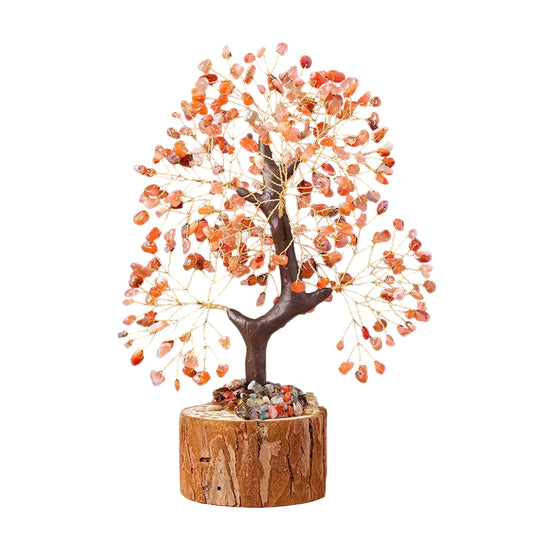 Decorative tree made of small stones on a wooden base with a white background