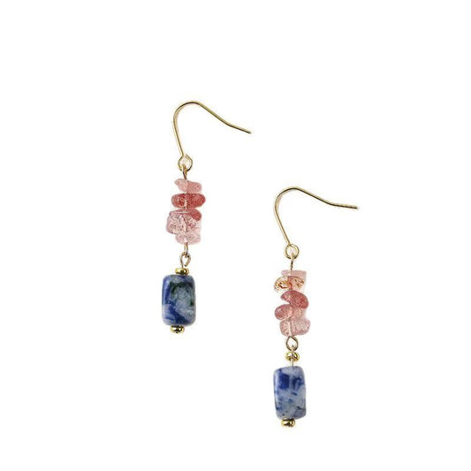 Pair of earrings with pink and blue beads on a white background