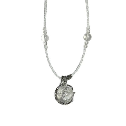 Silver necklace with a pendant on a white background