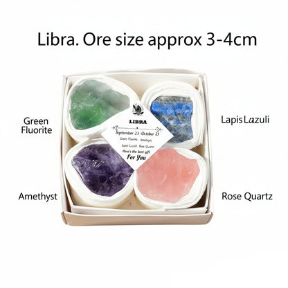 Box of colorful crystals with labels on a white background