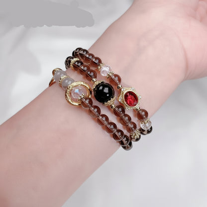 Multistrand beaded bracelet with gemstones on a wrist, 