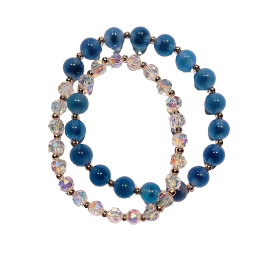 Blue beaded bracelet on a white background