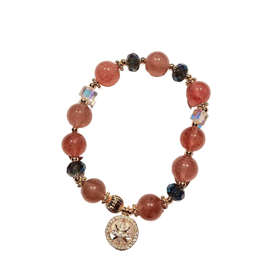 Bracelet with pink and blue beads on a white background