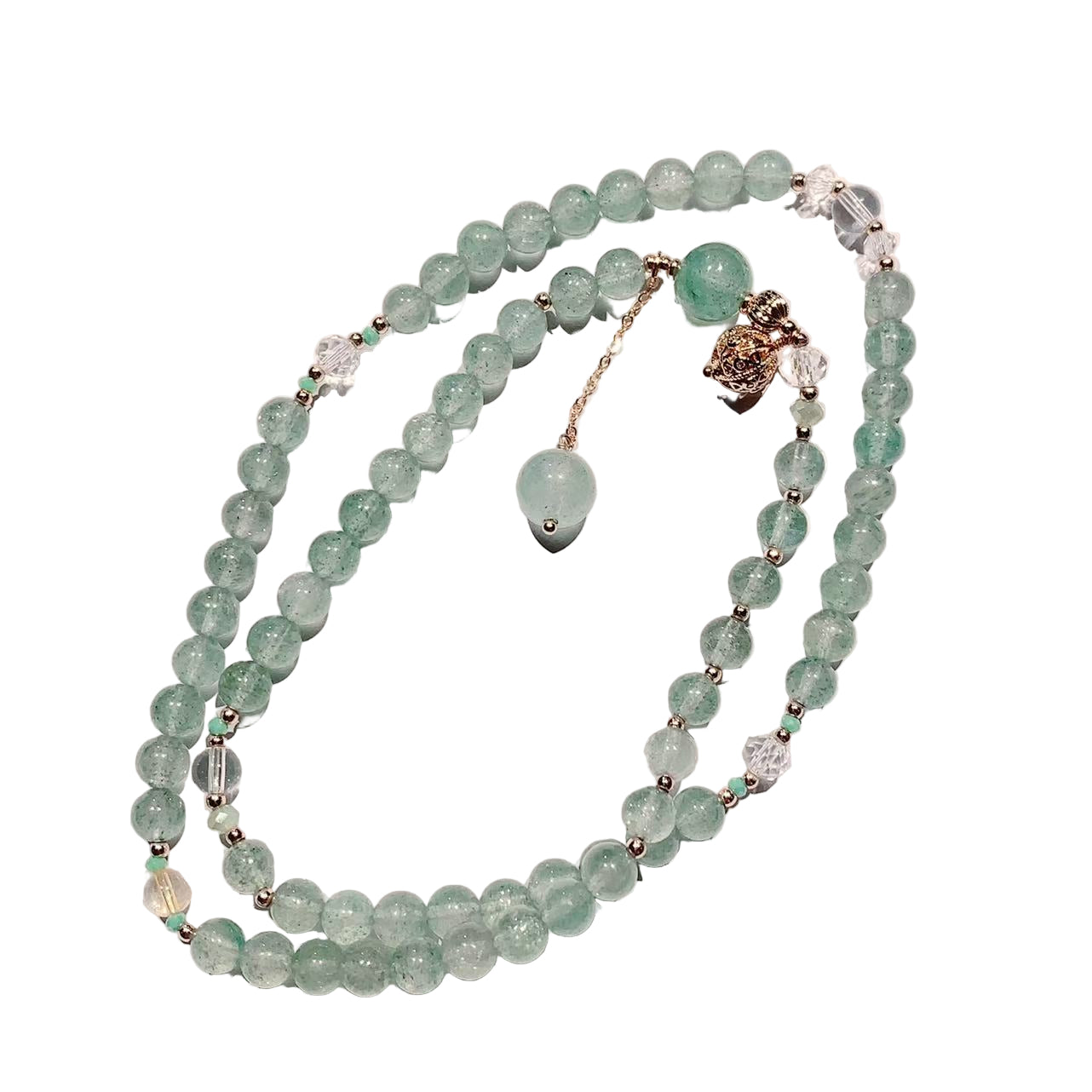 Necklace with green beads on a white background