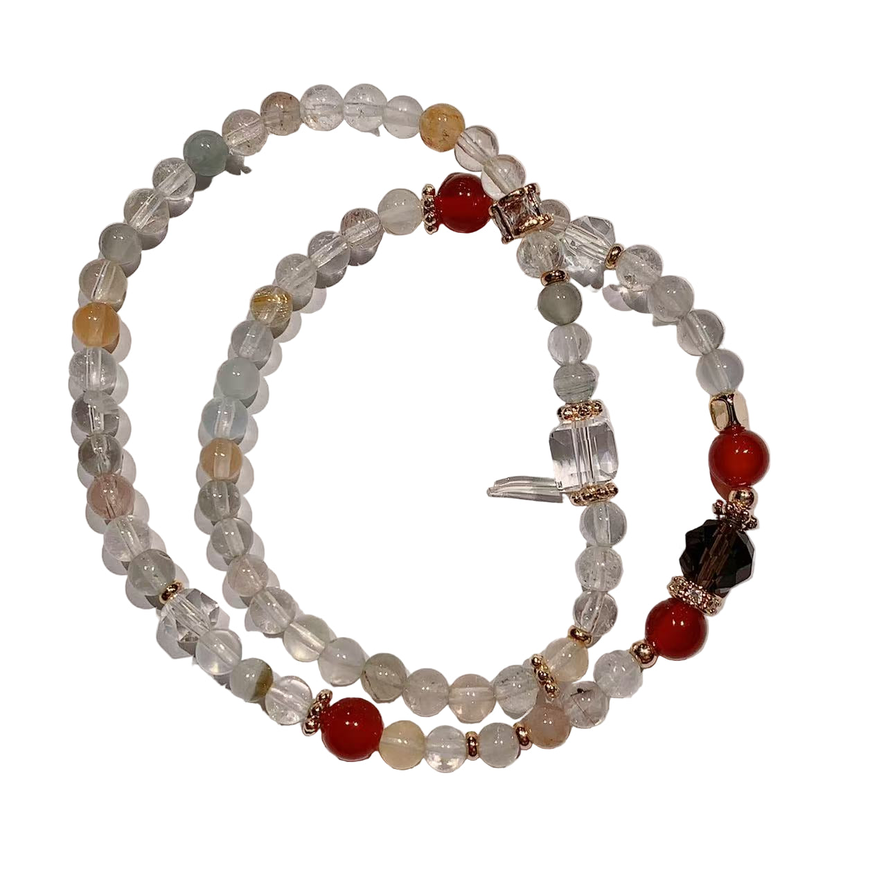 Beaded bracelet with red and brown beads on a white background