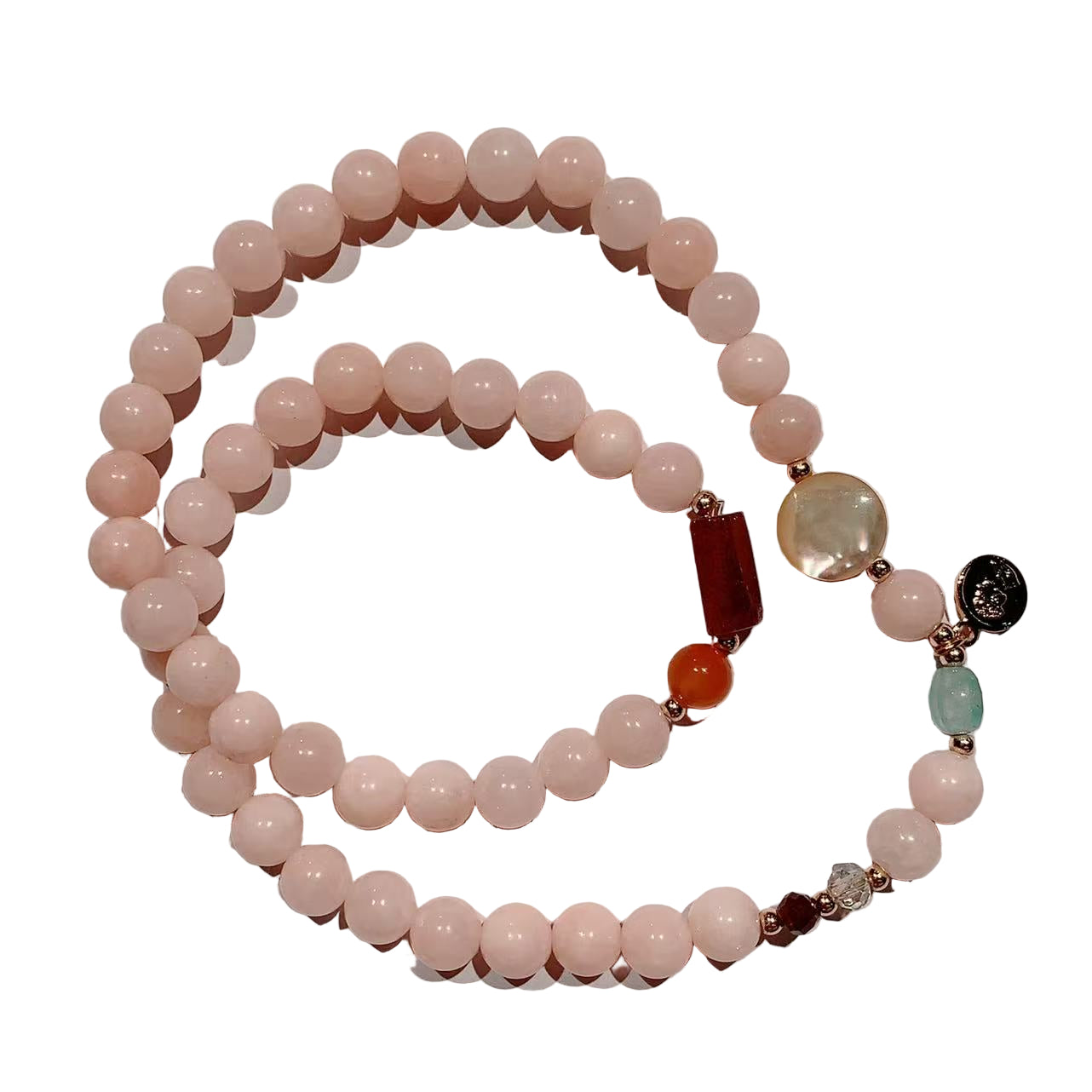 Beaded necklace with pink beads and colorful accents on a white background