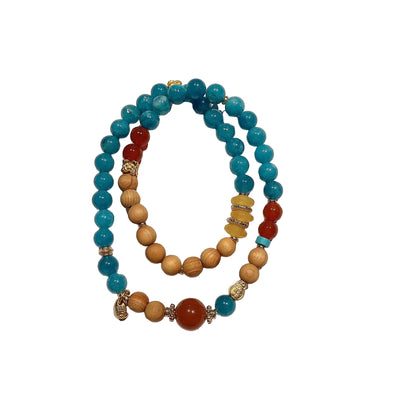 Multicolored beaded bracelets on a light background