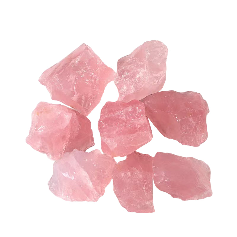 Pink crystal stones on a light  surface
