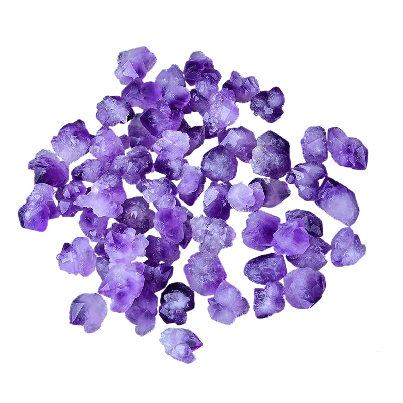 Purple crystal stones on a white surface