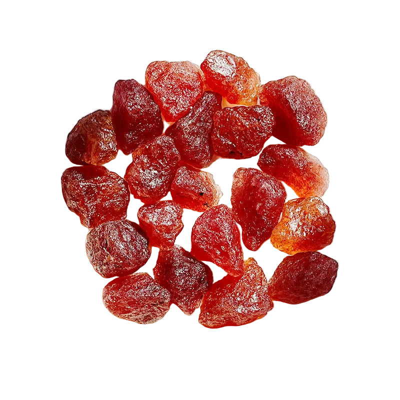 Red stone-like objects on a white background