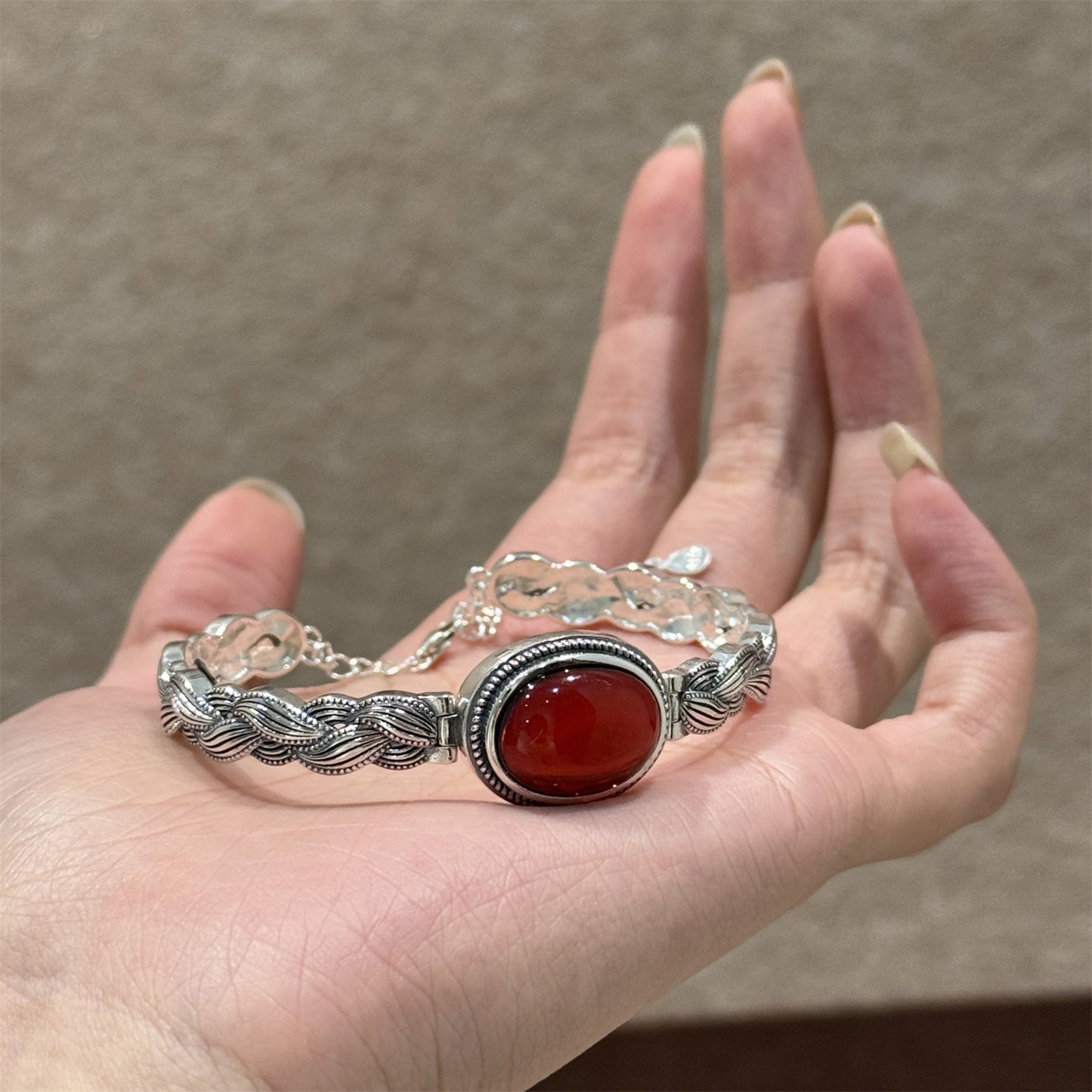Antique Thai Silver Braided Twist Bracelet - Elegant Blood Amber Oval Cabochon, Vintage Ethnic Style Jewelry for Sophisticated Women