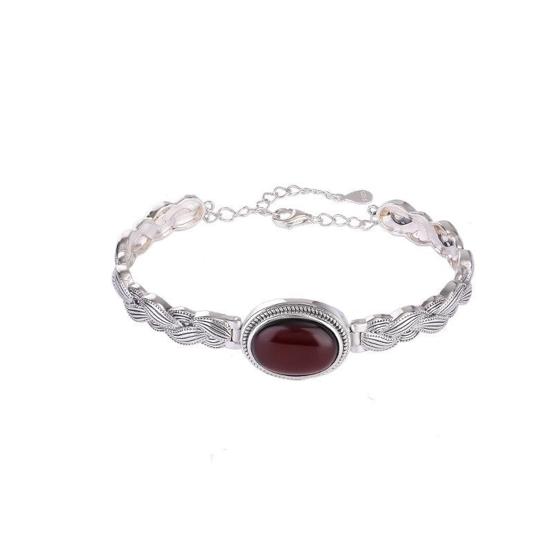Antique Thai Silver Braided Twist Bracelet - Elegant Blood Amber Oval Cabochon, Vintage Ethnic Style Jewelry for Sophisticated Women